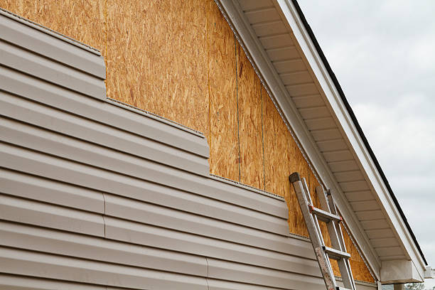 Professional Storm Damage Siding Repair technician working in Murrysville, PA